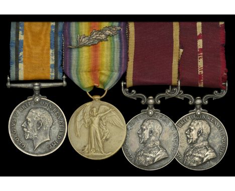 Four: Warrant Officer Class II G. Williams, Royal Army Service Corps, who was awarded an Immediate Meritorious Service Medal 