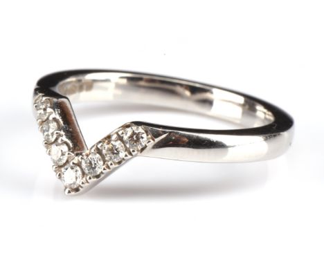 † 2mm shaped diamond set wedding ring in platinum, cutdown set with seven round brilliant diamonds, size K Please note that V
