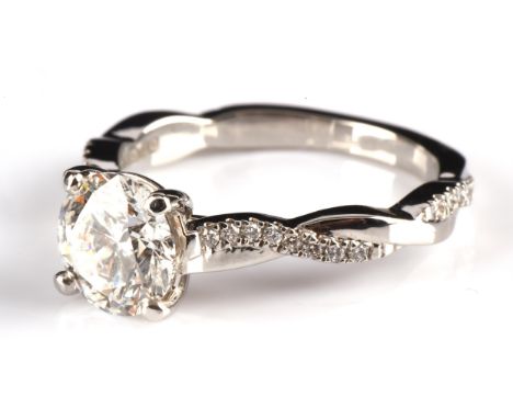 † Ingle & Rhode Cadenza ring, set with a 1.50 carat round brilliant cut lab grown diamond, diamond set shoulders, mounted in 