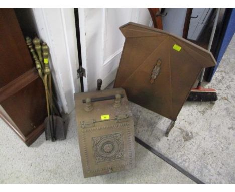 Fire related items to include a brass coal scuttle, a fire screen and fire irons 