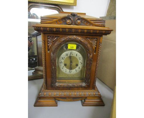 A 20th century oak Junghans mantle clock 19" h 
