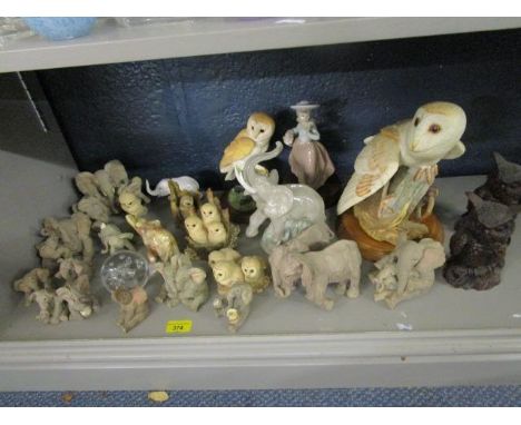 A collection of owls and elephant ornaments to include Border Fine Arts and Nao figures 