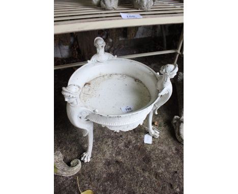A CAST METAL PLANTER of circular form raised on figural supports with claw feet
