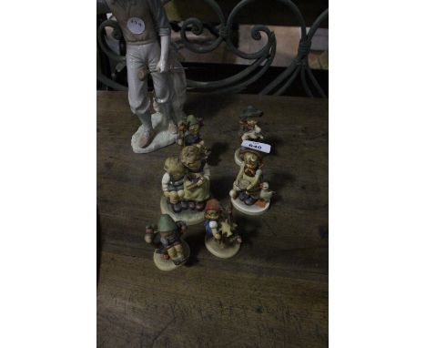SIX HUMMEL FIGURES together with a Marco China figure in the form of a golfer