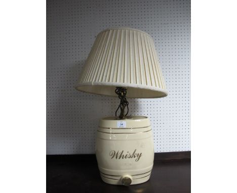 A WHITE GLAZED CHINA WHISKEY BARREL converted to a table lamp 67cm high