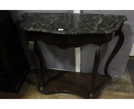 A CONTINENTAL KINGWOOD AND MARBLE TOP CONSOLE TABLE of serpentine outline the shaped moulded top with green vein marble top a