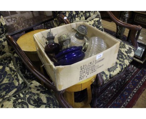 A COLLECTION OF OIL LAMP RESERVOIRS to include two ruby glass and one Bristol glass (5)