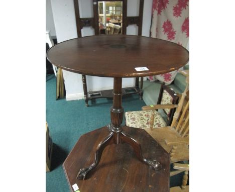 A MAHOGANY OCCASIONAL TABLE the circular dish top above a baluster column on tripod support with claw and ball feet 73cm (h) 