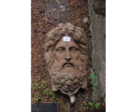 A TERRACOTTA FIGURAL WALL PLANTER