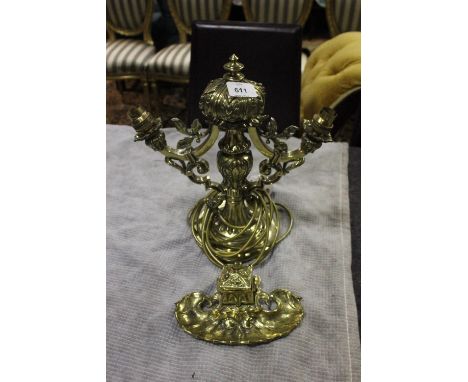 A VICTORIAN BRASS TWO BRANCH TABLE LAMP together with a brass inkwell