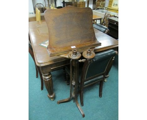 A BEECHWOOD MUSIC STAND with candle sconces raised on tripod support 133cm (h) x 51cm (w) x 11cm (d)