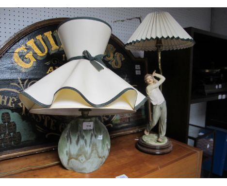 AN ELDERBUSH POTTERY TABLE LAMP together with a figural table lamp modelled as a golfer