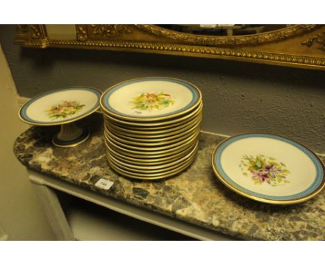 AN EIGHTEEN PIECE ROYAL WORCESTER FRUIT SET comprising seventeen side plates and comport the white ground with central floral