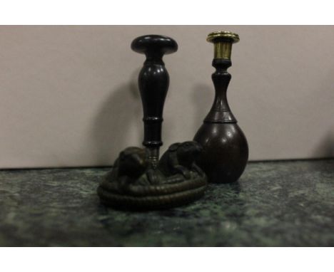 TWO SEALS together with a netsuke modelled as two mice in a coil of rope