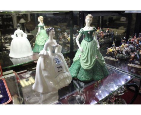 A ROYAL DOULTON FIGURE modelled as "Kelly" together with a Royal Worcester figure modelled as "Suzanna"