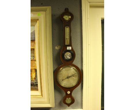 A GEORGIAN MAHOGANY BANJO BAROMETER with silvered dials inscribed "P Fringle Cork" 82cm high