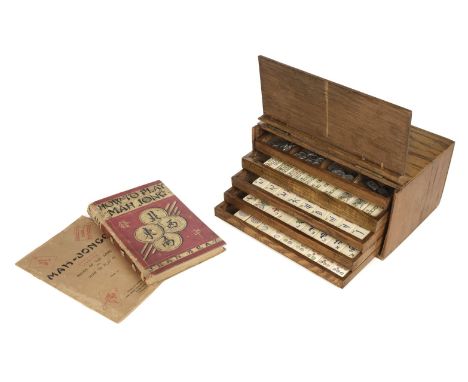 * Mahjong. A 1920s Chinese mahjong set, the oak box with shaped nickel plated carrying handle and hinged fall enclosing 5 tra