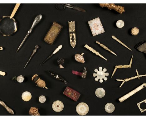 * Sewing. A collection of sewing tools, 19th and 20th century, including several mother of pearl spools and thread/ribbon hol