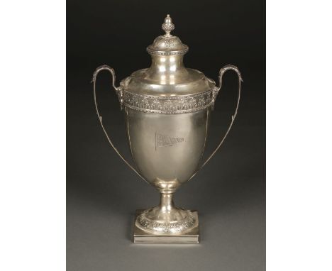 * Trophy. An Impressive George V silver trophy by William Hutton &amp; Sons, Sheffield, 1914, the substantial twin handle tro