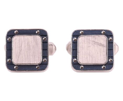 Cartier - A pair of 'Santos de Cartier' cufflinks, of rounded square design, with brushed central plaque and a blue border, f