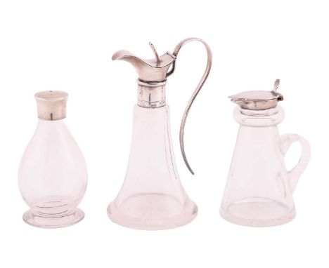 An Edwardian glass and silver-mounted whiskey noggin, Birmingham, 1908, together with a second silver-mounted whiskey noggin 