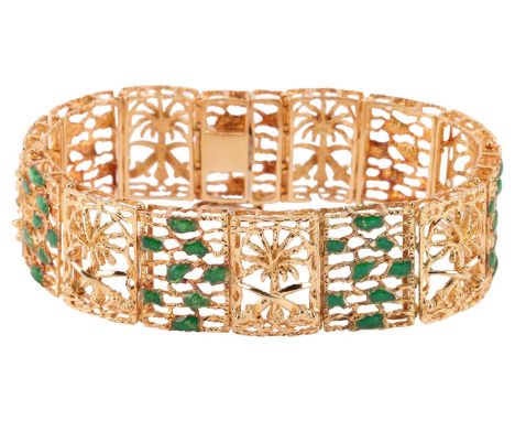 A Saudi Arabian panel link bracelet, the rectangular panels featuring the emblem of Saudi Arabia, alternating with textured p