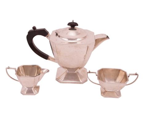 An Indian three-piece white metal tea service, of Art Deco design with bakelite mounts, marked 'WB SIL', comprising teapot (2