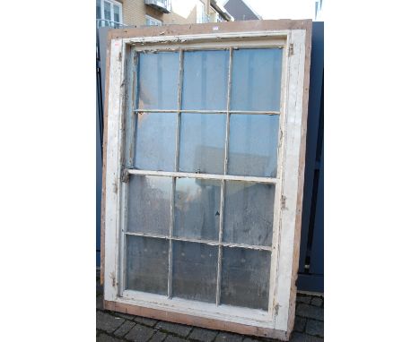 A 19th century painted pine large sash window (some window panes are damaged, overall requires restoration), outer dimensions