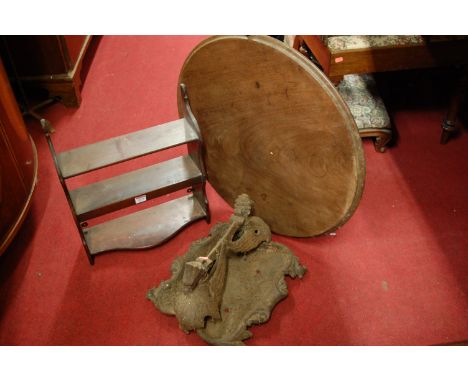 A 19th century fruitwood hanging wall shelf; a Victorian cast iron boot-scrape; and a one-piece mahogany occasional table top