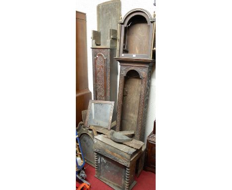 Two antique relief carved oak longcase clock cases only (each with damages and for restoration)