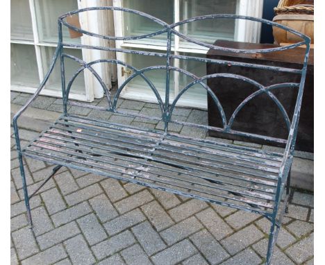 A Regency style green painted and galvanised metal slatted two-seater garden bench, w.114cm