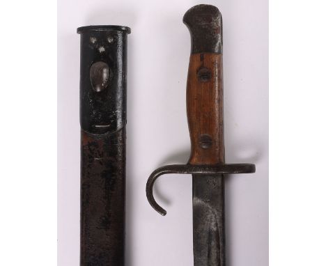 British 1907 Hook Quillon Bayonet, with two piece wooden grips, steel pommel and cross guard which is stamped ‘V 10527’. Hous