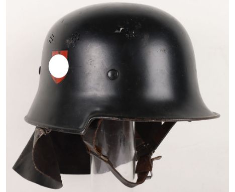 WW2 German Fire Brigade “Feuerwehr” Helmet, Dark blue/black steel helmet with both decals intact. Original and matching leath