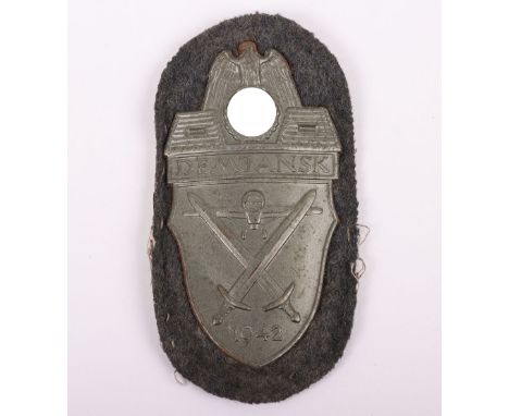 WW2 German Luftwaffe Issue Demjansk Campaign Shield, steel construction with integrated side prongs. Complete with original b