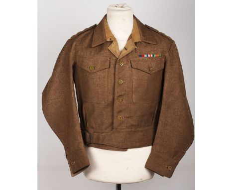Unusual WW2 RAC Battle Dress Blouse, being an economy pattern with button front, yellow backed captains rank pips to the shou