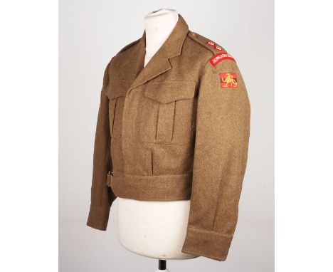 Scarce Hong Kong Regiment Officers Battle Dress Blouse, being a privately tailored example with far east made embroidered whi