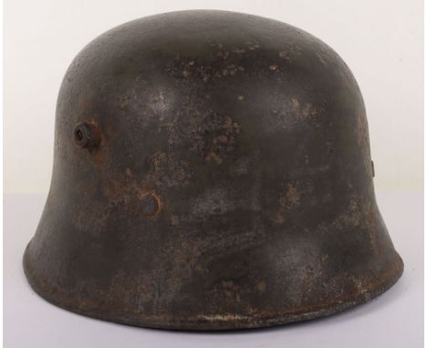 Rare WW1 Turkish M-18 Steel Combat Helmet, a as found example of the rare visorless helmet which was produced by the Germans 