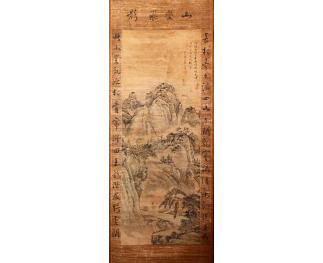 A 20TH CENTURY CHINESE SCROLL PAINTING, a figure standing at the base of a mountainous landscape, the main image bordered wit