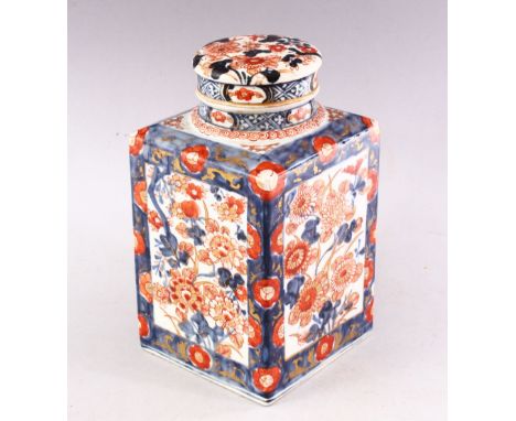 A 19TH CENTURY JAPANESE IMARI SQUARE SHAPED TEA CADDY AND COVER, painted with panels of chrysanthemums, overall 20cm high.