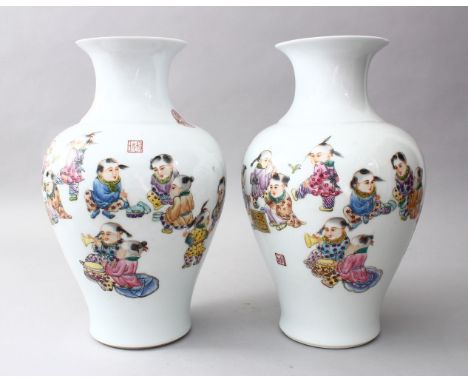 A PAIR OF CHINESE REPUBLIC PERIOD FAMILLE ROSE PORCELAIN VASES OF BOYS PLAYING, the body of the vases decorated with boys pla