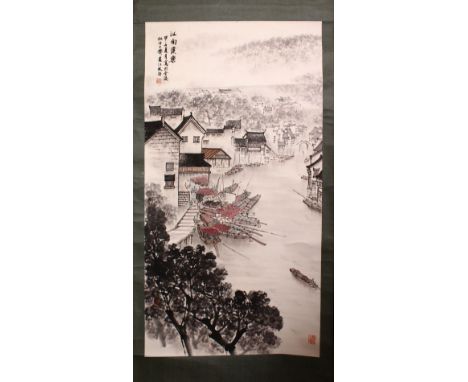TWO 20TH CENTURY CHINESE SCROLL PAINTINGS, one depicting junks in a river landscape with buildings, the other a parkland scen