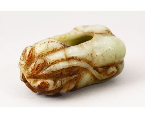 A GOOD 20TH CENTURY CHINESE CARVED JADE BRUSH WASH IN THE FORM OF A FRUIT, 9cm wide.