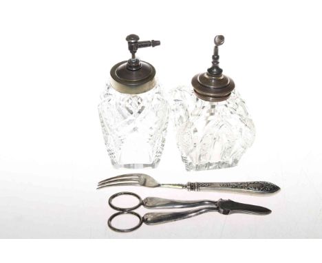 Two silver mounted atomisers, Russian silver fork and plated grape scissors (4)