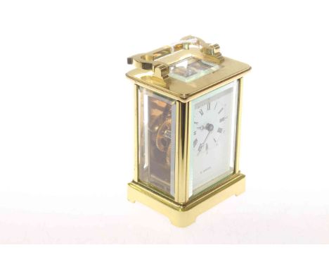 Brass cased carriage clock of good quality, English, signed H. Samuel, 11cm high excluding handle