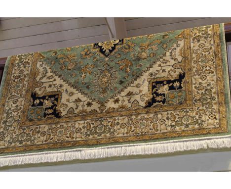 Heriz carpet with a green ground 2.30 by 1.60