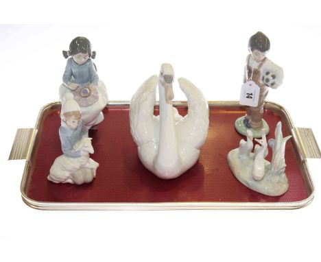 Lladro swan, Lladro girl wit lamb, Nao geese group and two figures