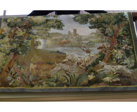 Abusson tapestry wall hanging depicting a Highland stag being harried by two hounds, 1.25 by 1.84