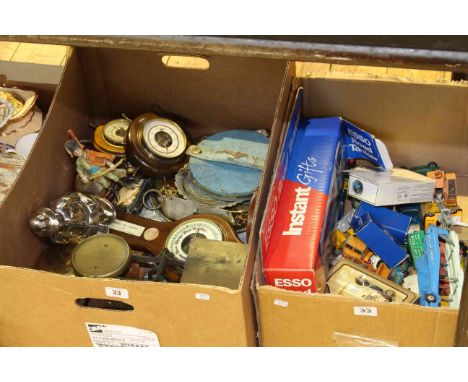 Two boxes of model vehicles, barometers, tape measures, postal scales, etc