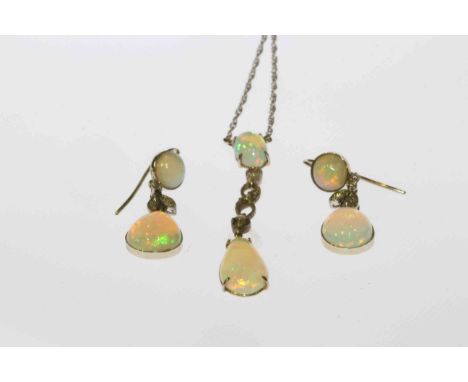 Opal and diamond pendant with matching earrings