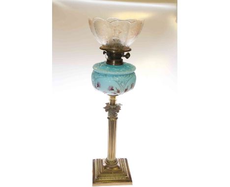 Brass corinthian column oil lamp with blue glass and floral painted glass reservoir and etched shade